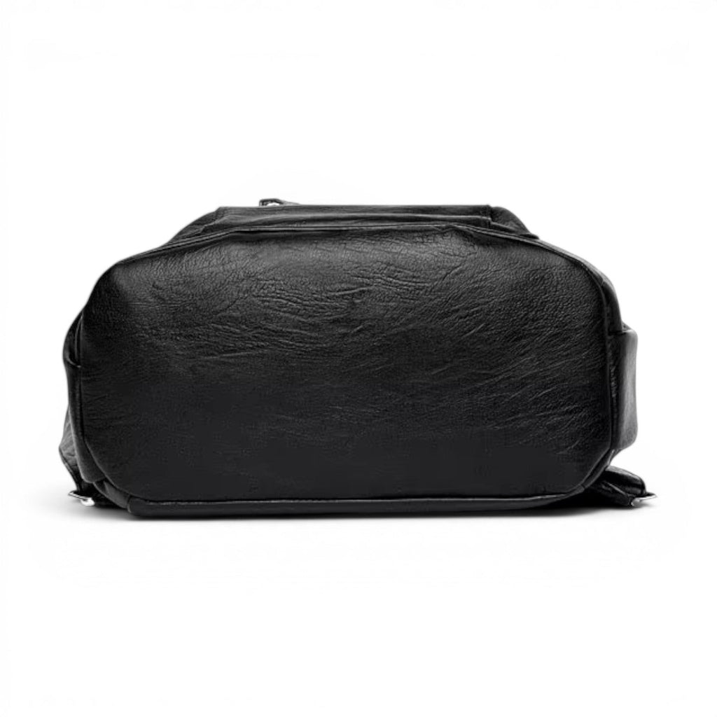 Vue de dessous du sac à dos vintage en cuir noir Sac avec finition texturée et fermeture éclair