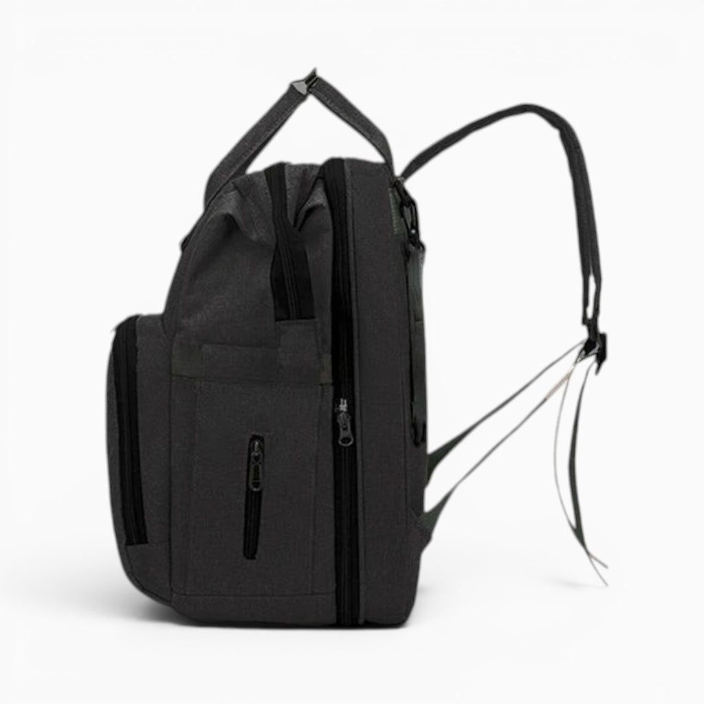 Sac sac à dos à langer noir convertible en lit de voyage pliable avec compartiments de rangement spacieux