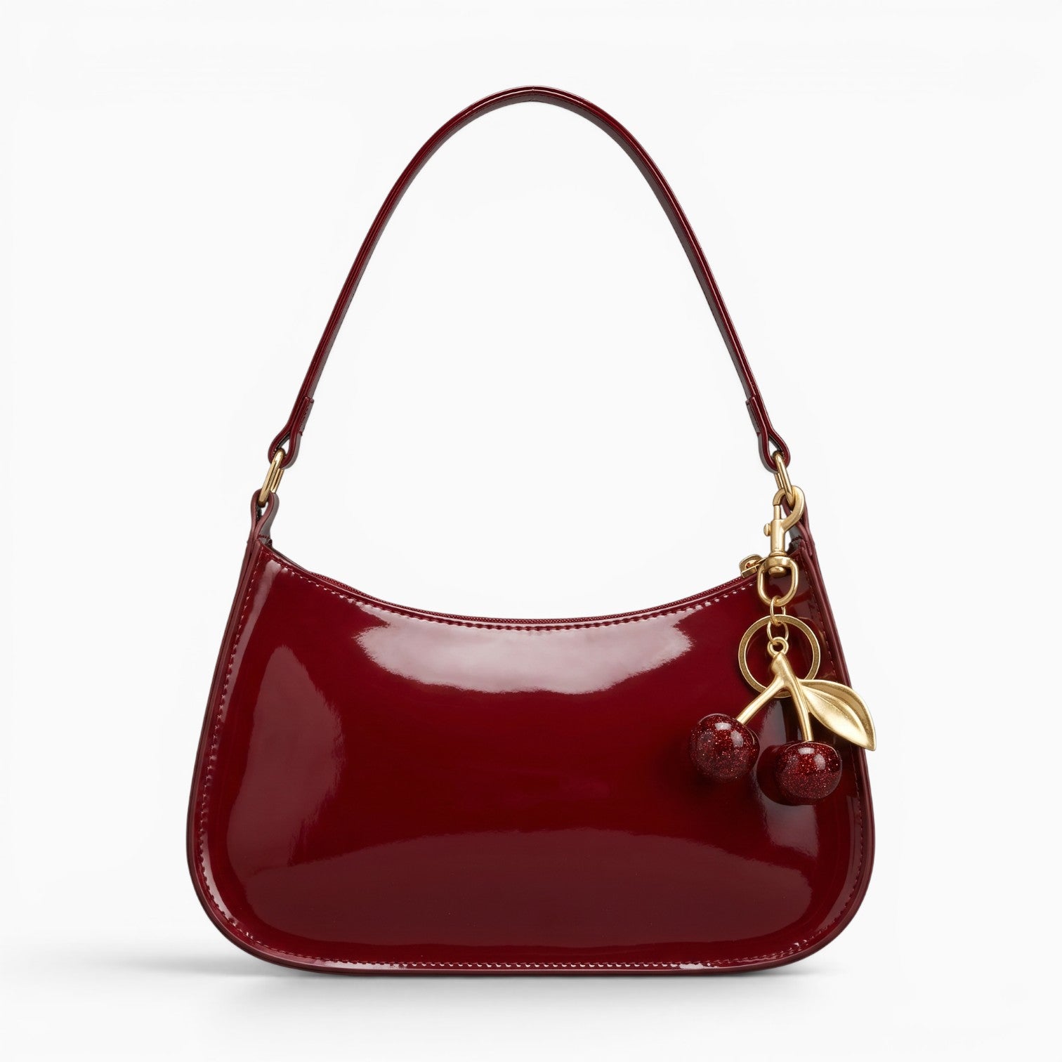 Sac à main Yogodlns rouge verni en cuir PU avec pendentif cerise, style sac baguette élégant pour femme.